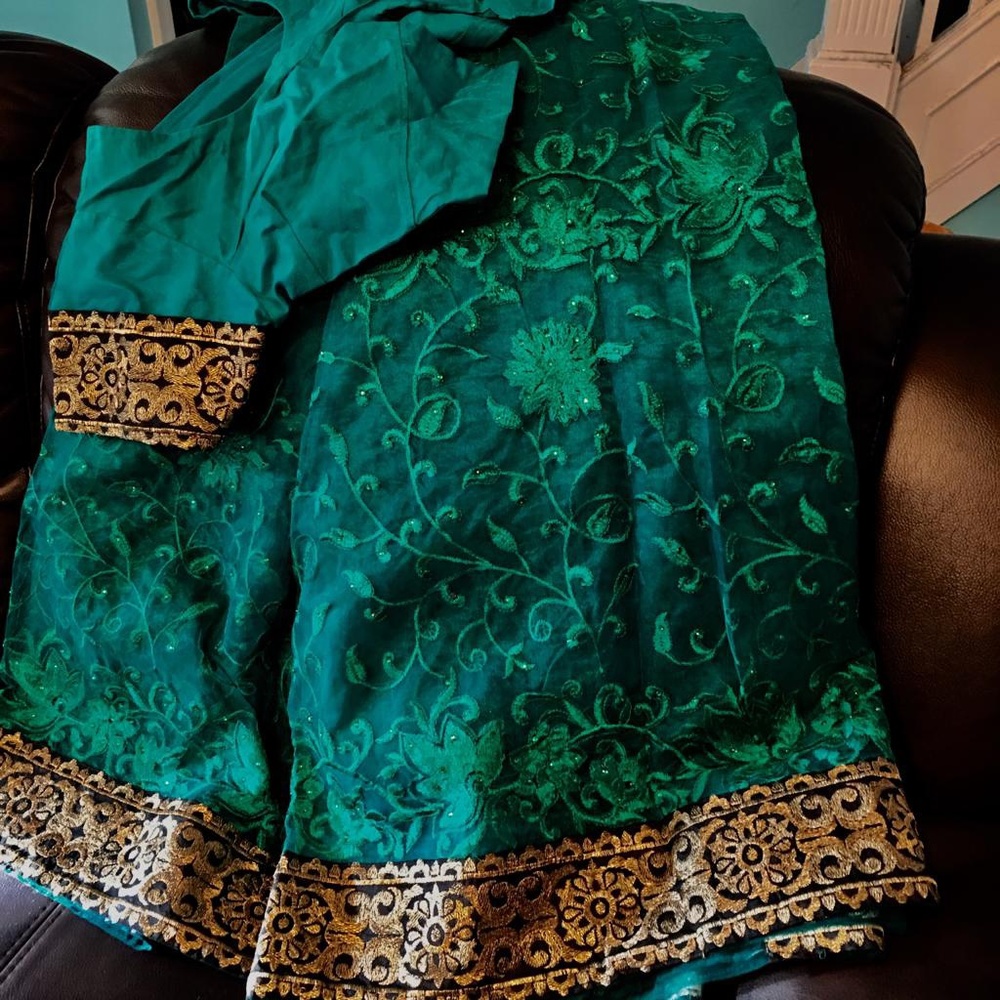 Dark green black gold saree